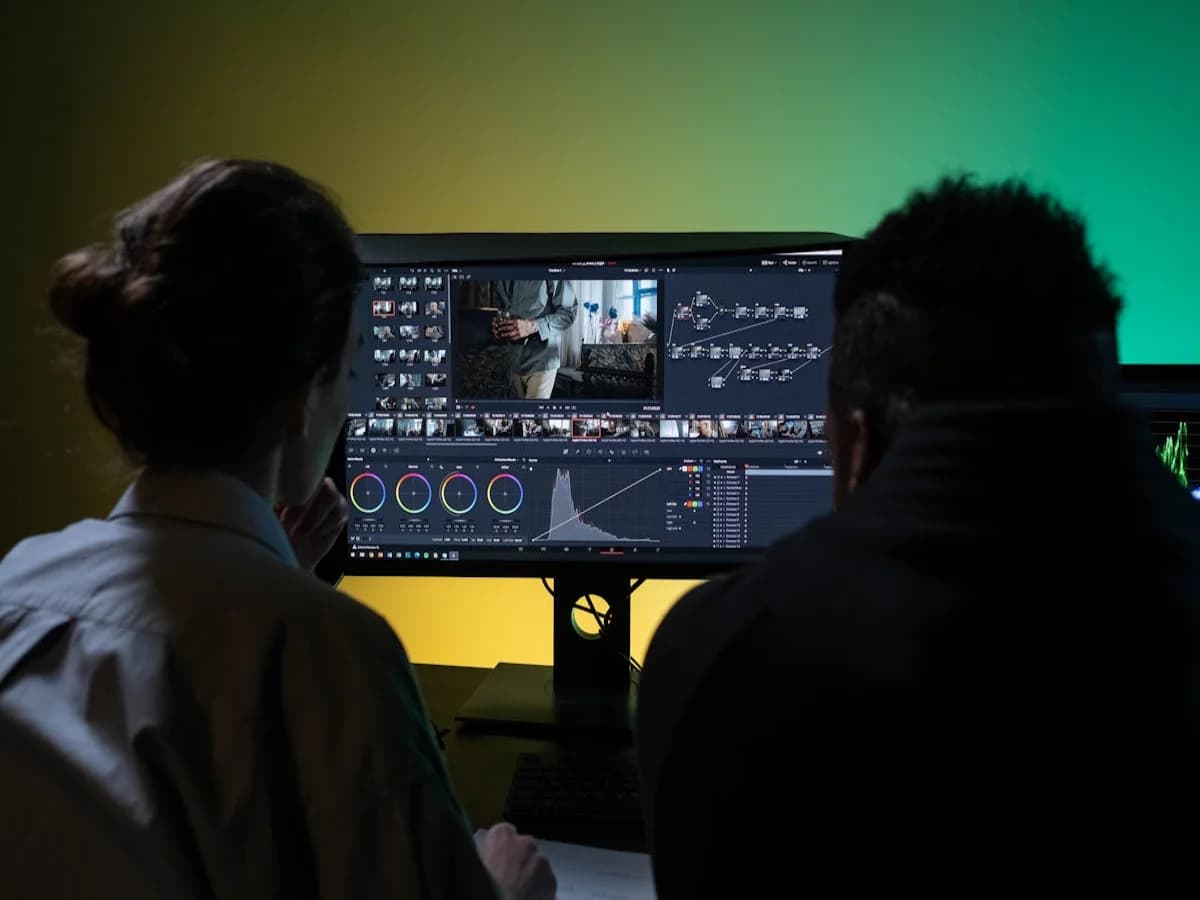 Omni Video creative agency team reviewing video ads on monitor
